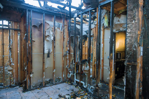 Professional Fire Damage Restoration technician working in Griswold, IA